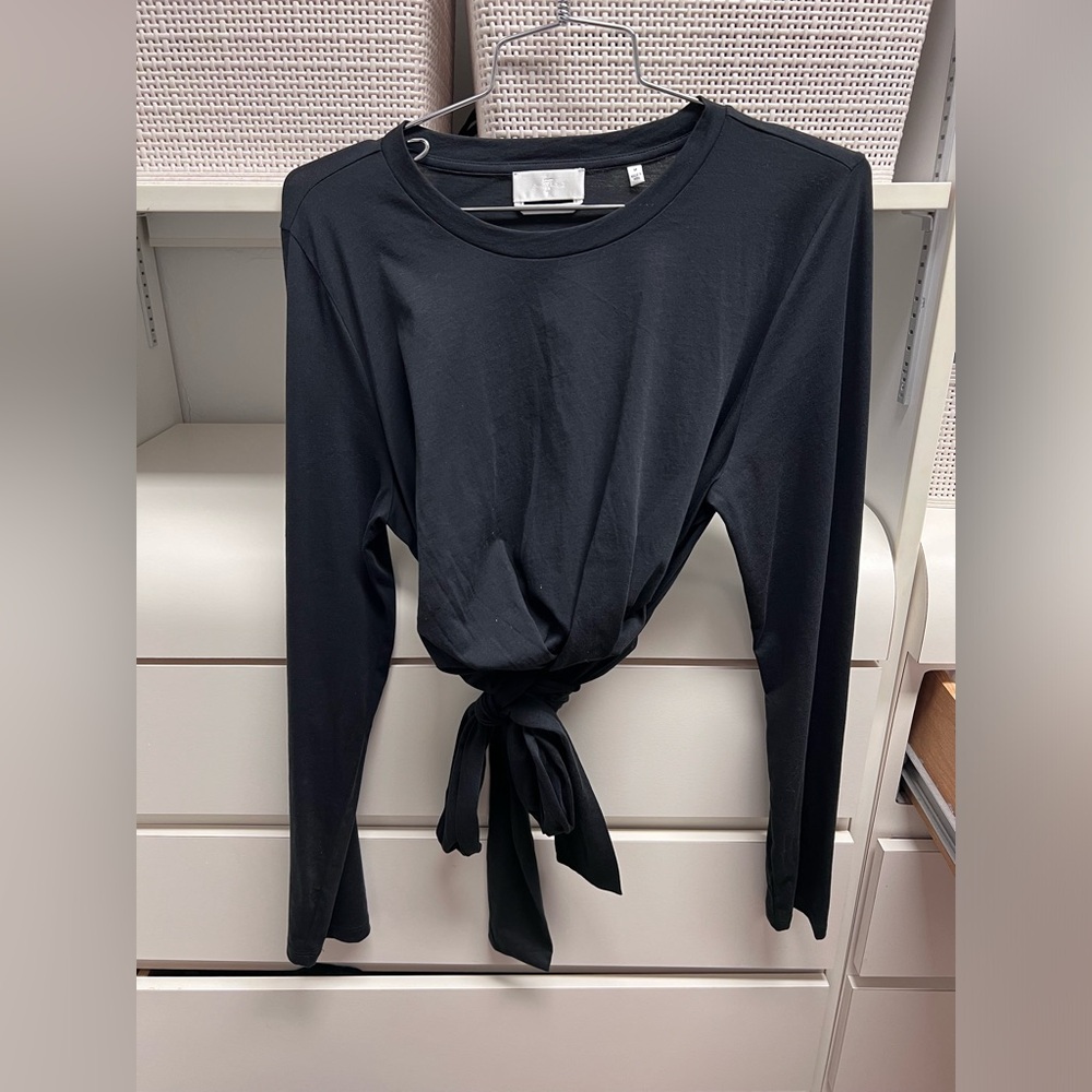 Wrap around black blouse by 7 for all mankind
